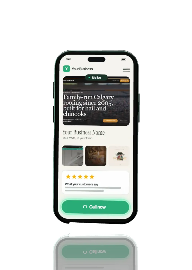 The phone facing front with the finished website live on screen